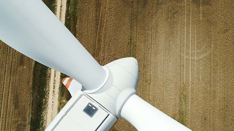 Aerial closeup view of wind turbine